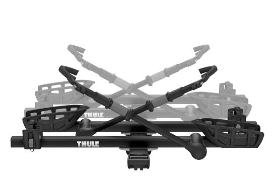 Thule T2 Pro XT Add-On Hitch Rack Bike Mount attached to a vehicle, carrying four bikes securely.