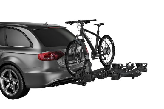 Thule T2 Pro XT Add-On accommodating various bike types, including mountain and fat bikes with tires up to 5 inches wide