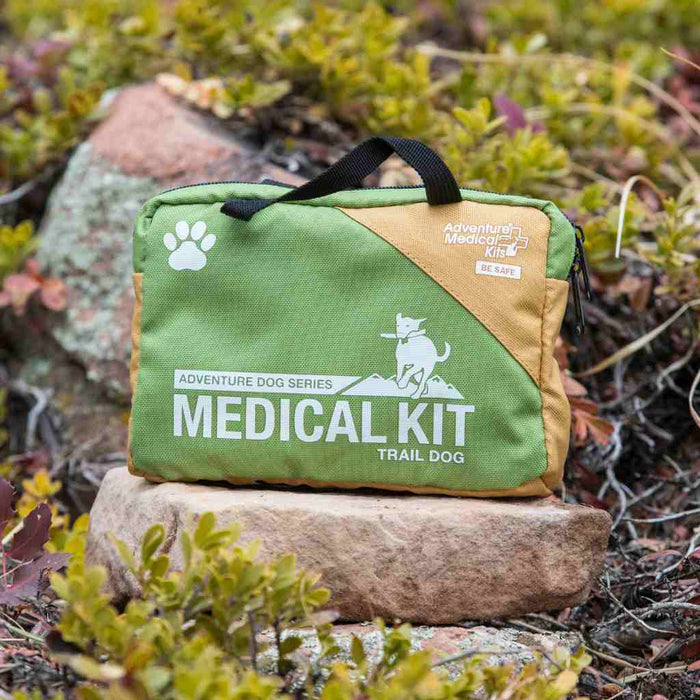 Trail Dog Medical Kit stored in a red waterproof pet first aid bag