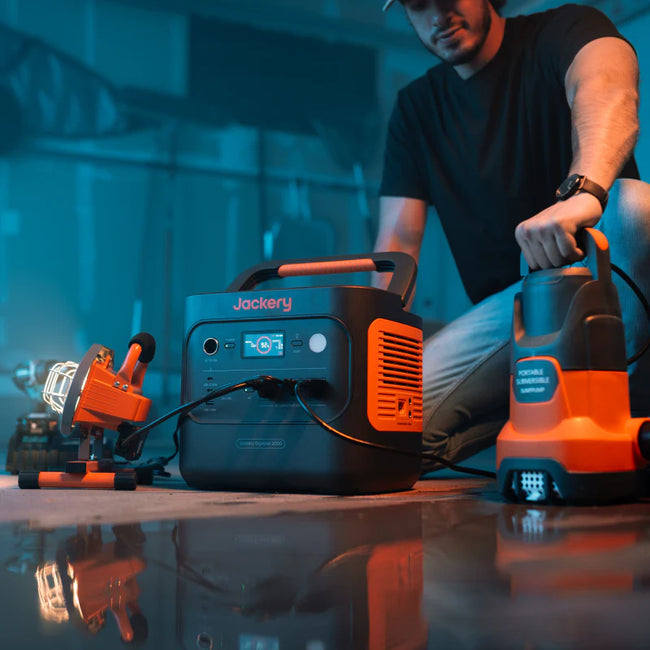 Portable generator powering refrigerator and lights during blackout