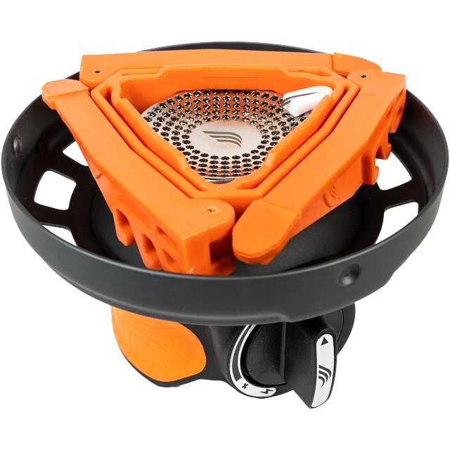 A Jetboil Flash 1.0L cooking system packed inside a hiker’s backpack along with other essential camping gear, demonstrating its compact and portable design.