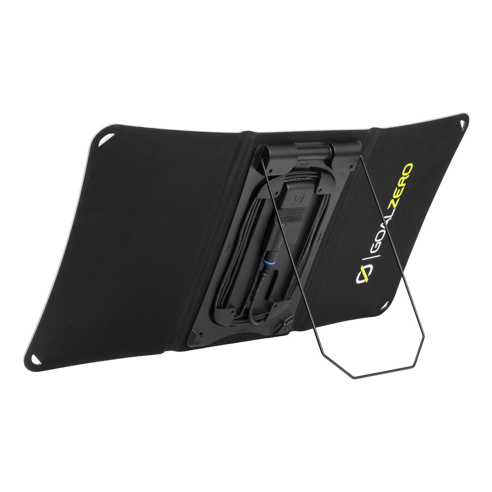 Compact Nomad 20 solar charger angled on its built-in kickstand in sunlight.