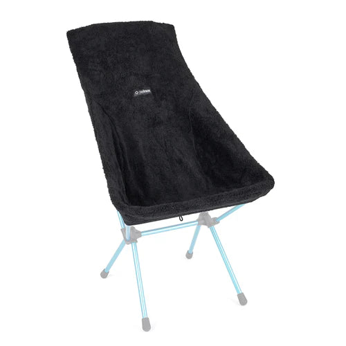 Reversible puffy seat warmer for Helinox Sunset and Beach Chairs, featuring cozy fleece and quilted polyester for extra warmth and cushioning