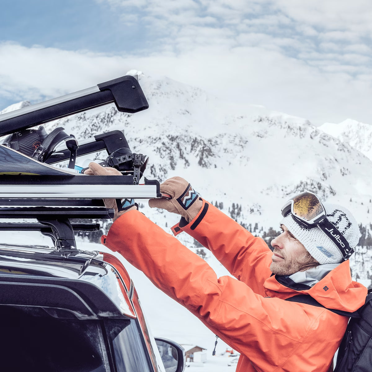 Universal-fit ski rack compatible with Thule WingBar, SquareBar, and factory racks