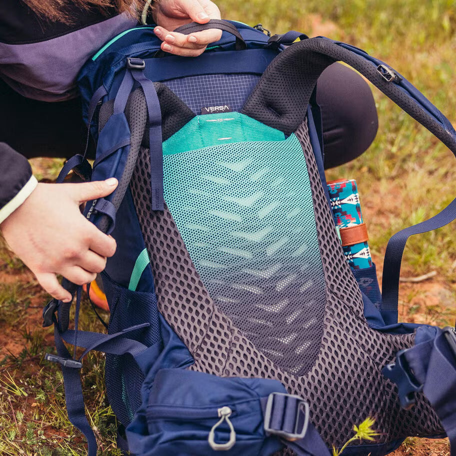 Gregory backpacking pack with ventilated shoulder harness and safety whistle sternum strap