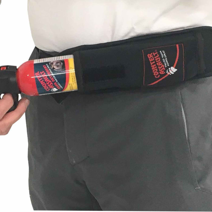 Bear spray holster with adjustable straps on backpack harness