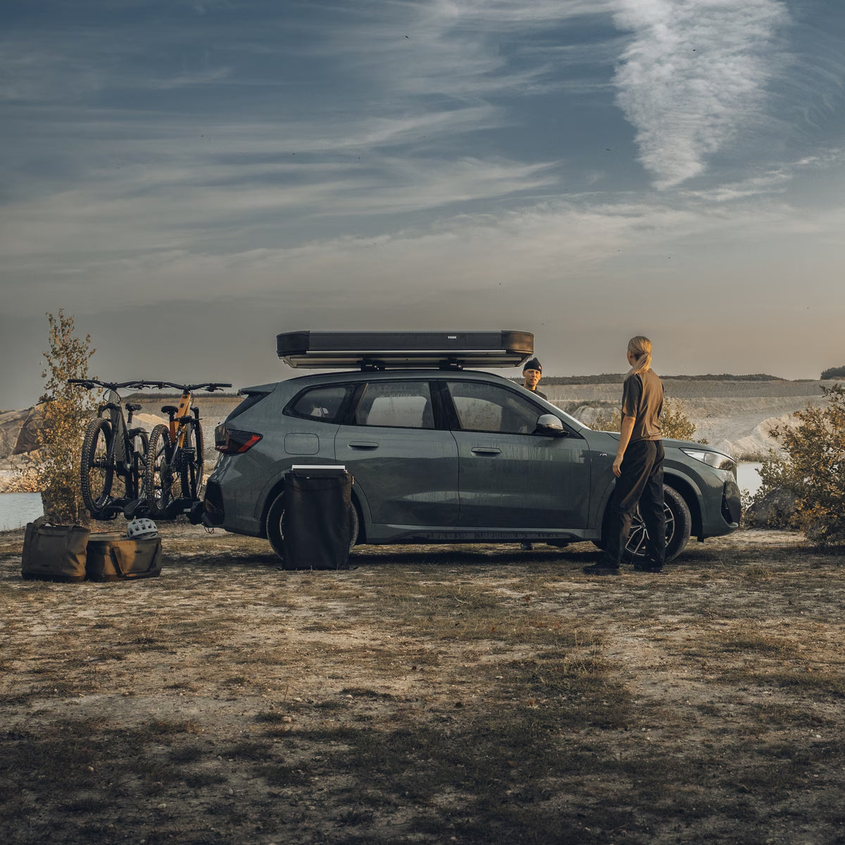 Thule Widesky rooftop tent camping setup with rainfly and ventilation panels