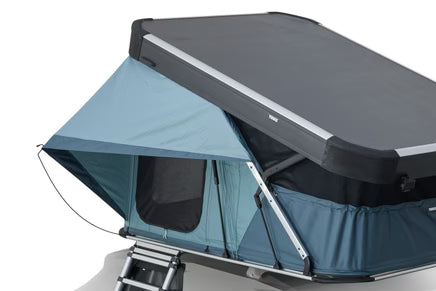 Thule Widesky rainfly extending over tent door for shade and rain protection