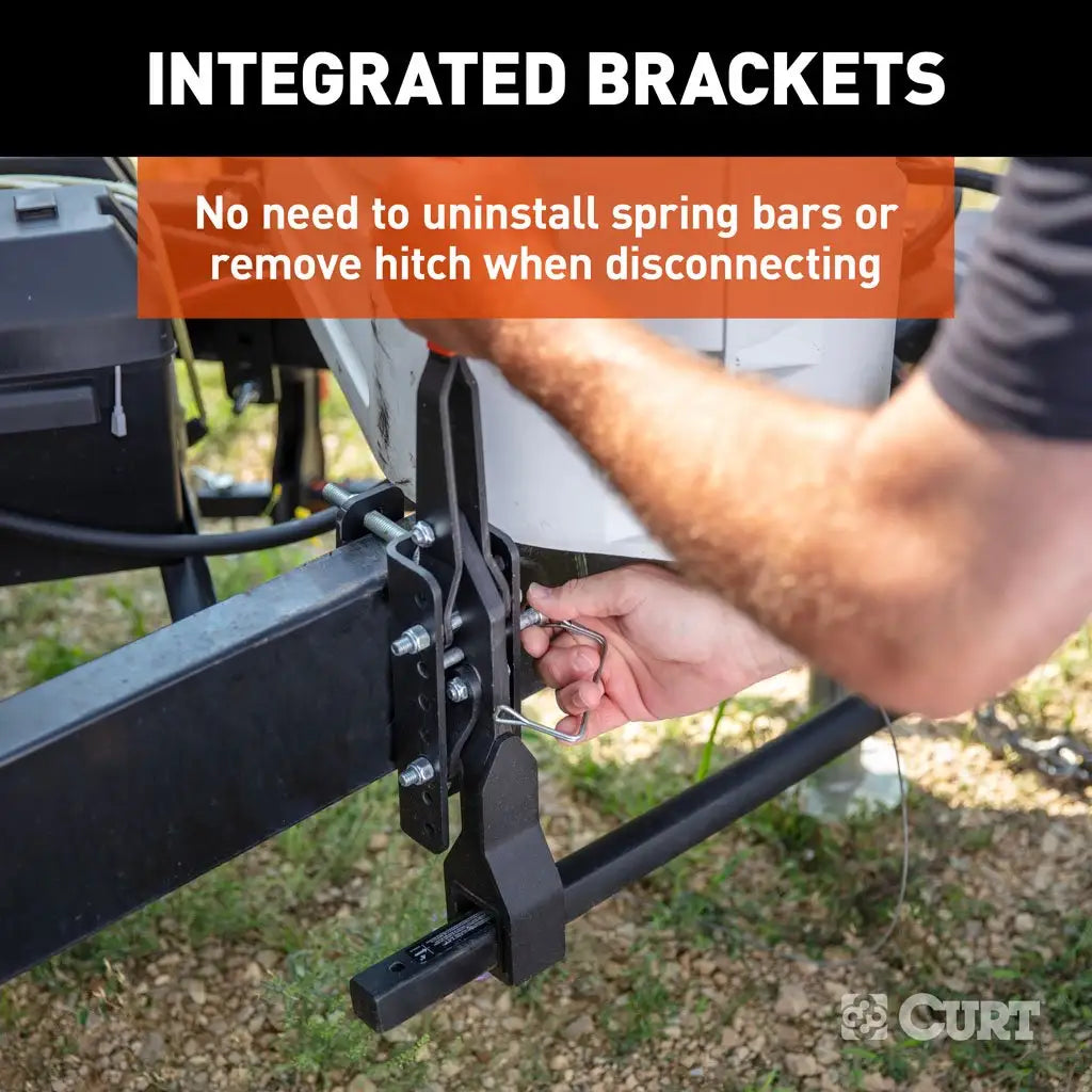 CURT TruTrack weight distribution hitch installed on a tow vehicle and trailer for stable towing