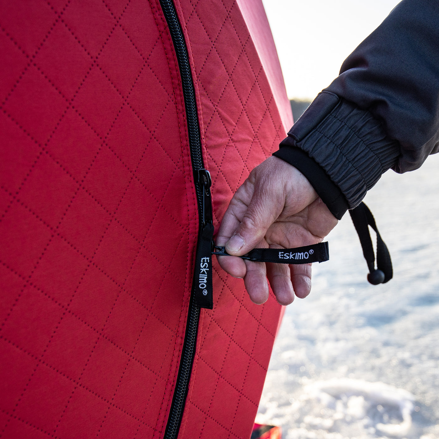 Detachable and replaceable hook-and-loop window panels on the QuickFish 2i, allowing adjustable shelter ventilation