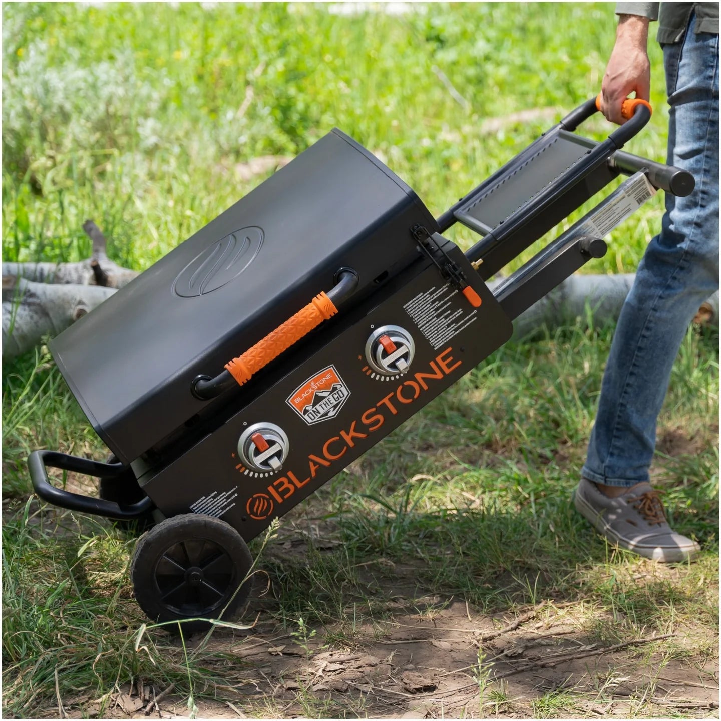 Blackstone 22 inch travel griddle with roll and go legs and secure hood latch