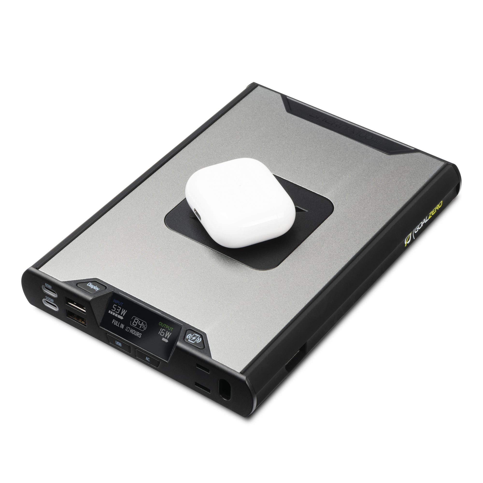 Compact portable power bank with integrated 100W AC inverter, fast USB-C charging, and wireless charging pad