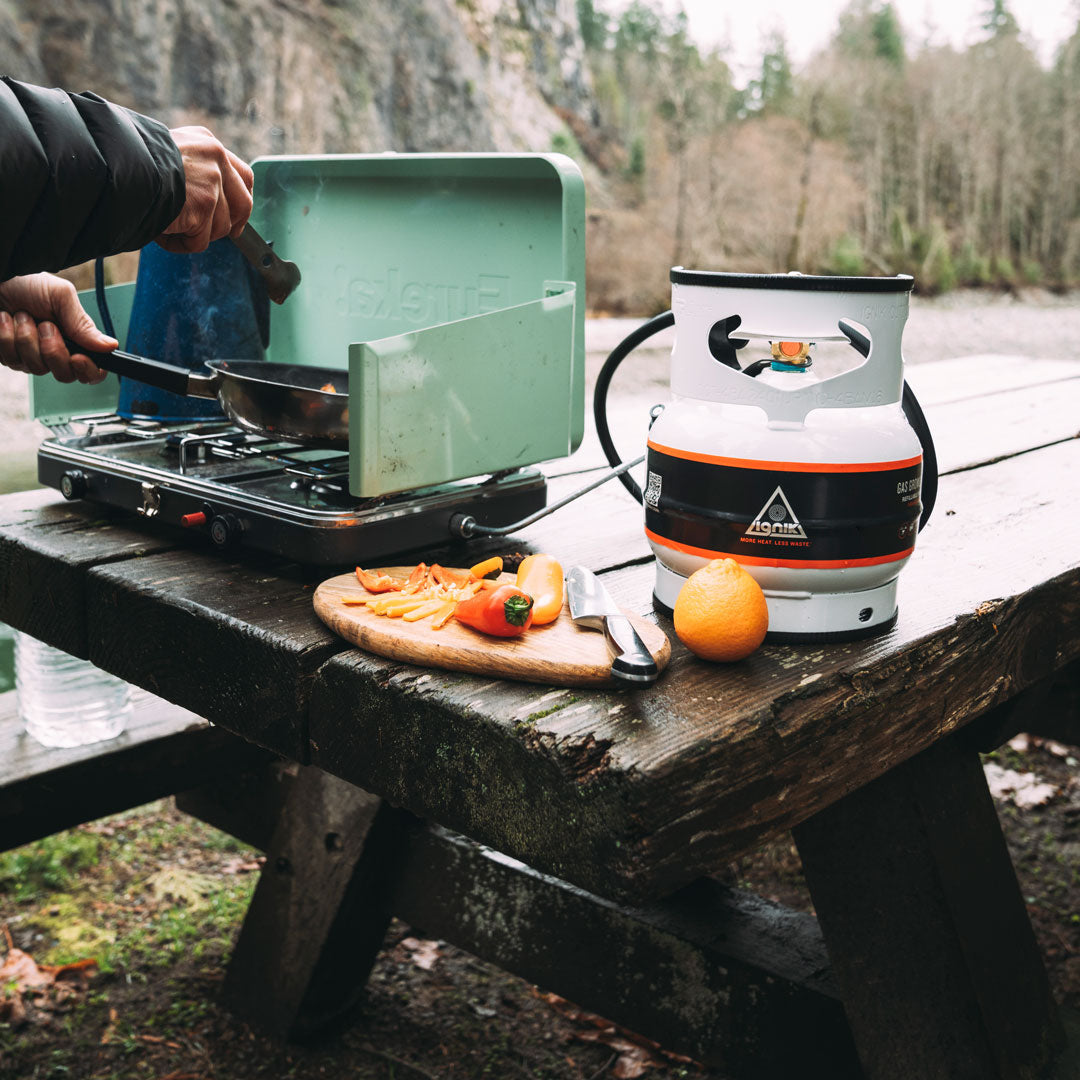 Gas Growler 3.8 propane tank with 4ft adapter hose and rugged protective case for easy portability and outdoor use