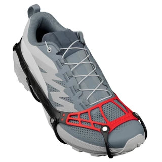Kahtoola MICROspikes Ghost lightweight ice cleats featuring stainless steel spikes and TPU traction matrix