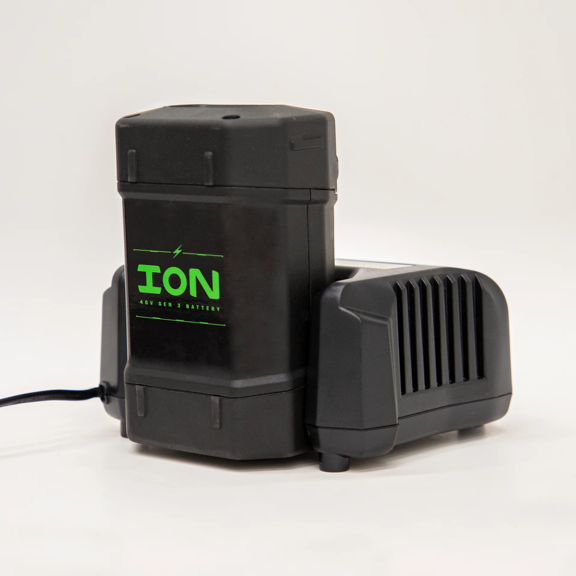 IION® Gen 3 Auger Charger compatible with Gen 1 and Gen 3 batteries.