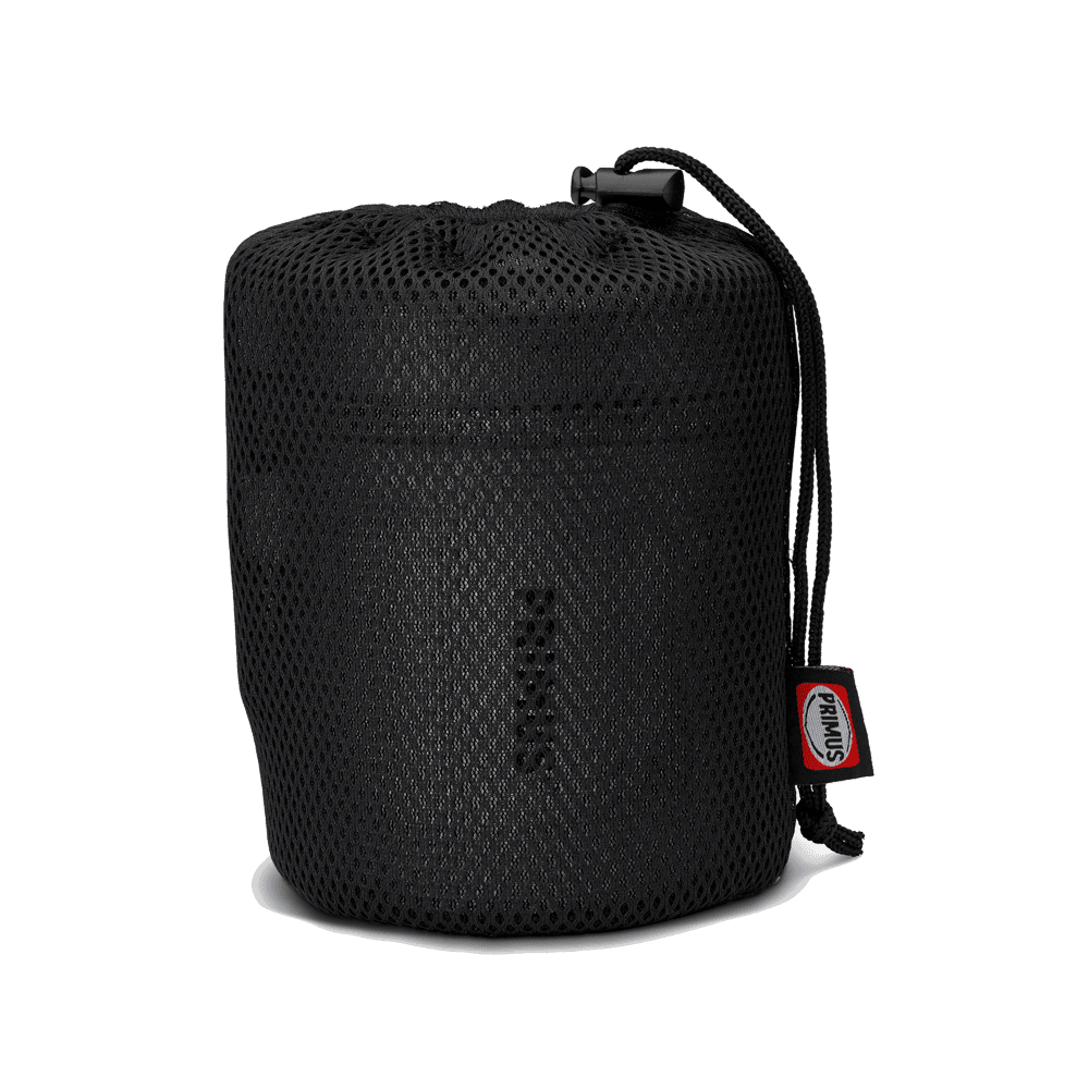 Essential Trail Stove boiling water in anodized aluminum pot using 2500W flame with wind-blocking supports for stability.