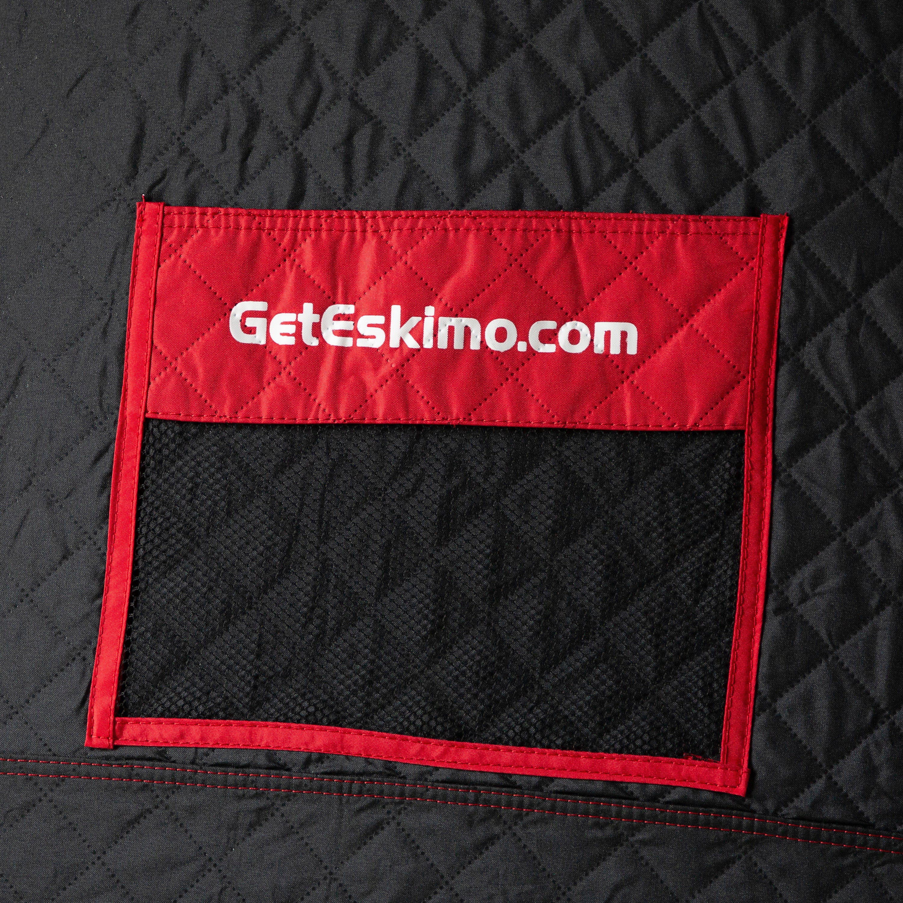 Fully set up QuickFish™ 6i ice fishing shelter with dimensions of 140 inches long, 70 inches wide, and 80 inches high.