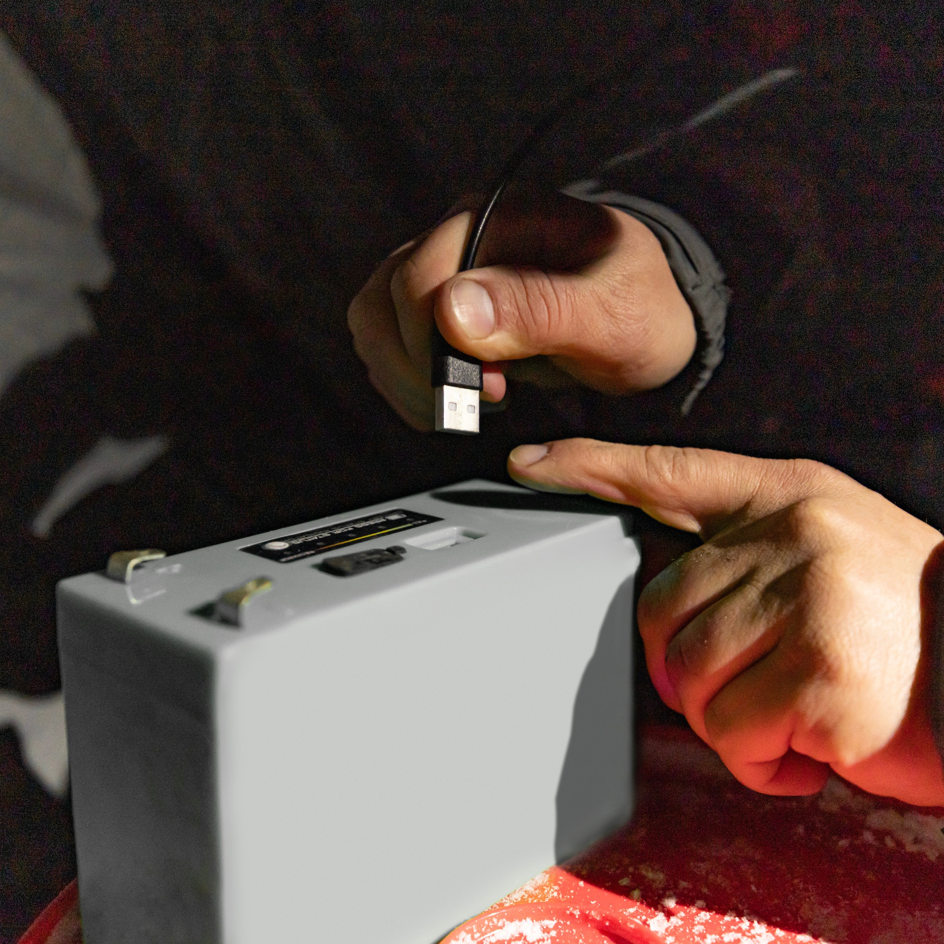 Hook-and-loop straps neatly securing multiple cords, illustrating effective cord management for organized use.