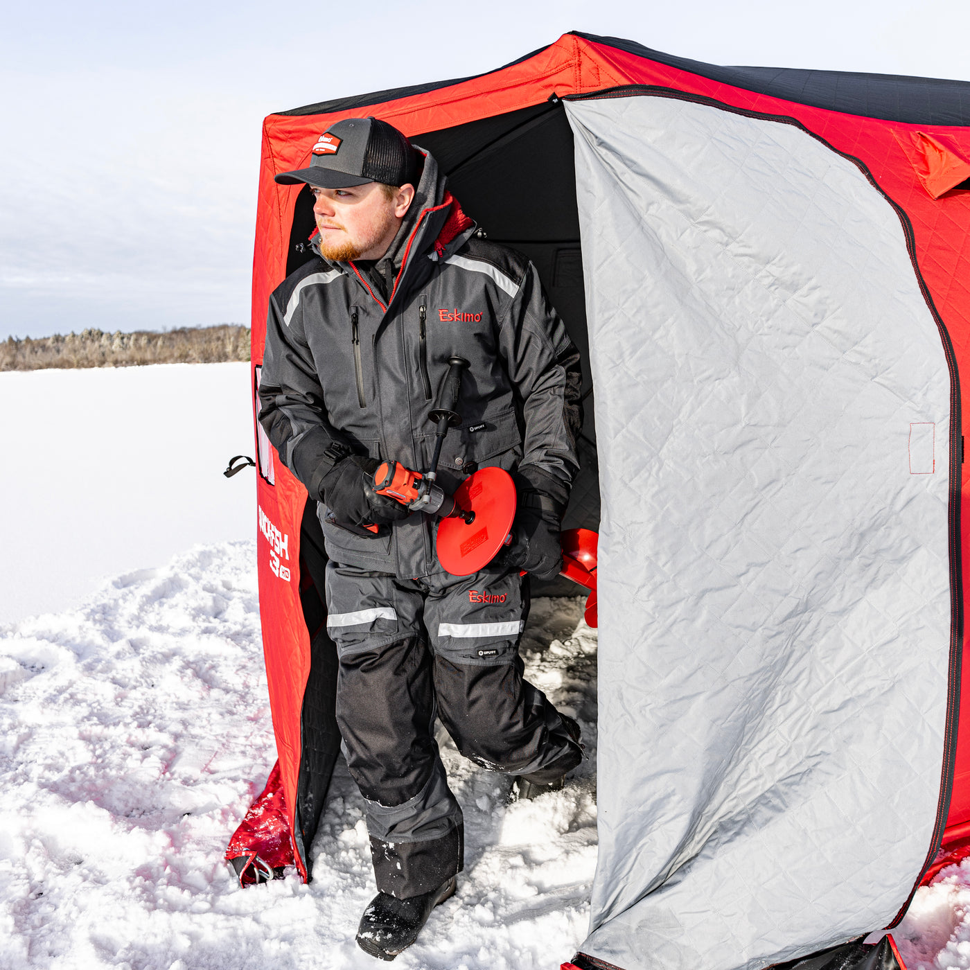 No-trip door of the QuickFish HD shelter, zipping from ice-level for easy gear access and safe entry and exit