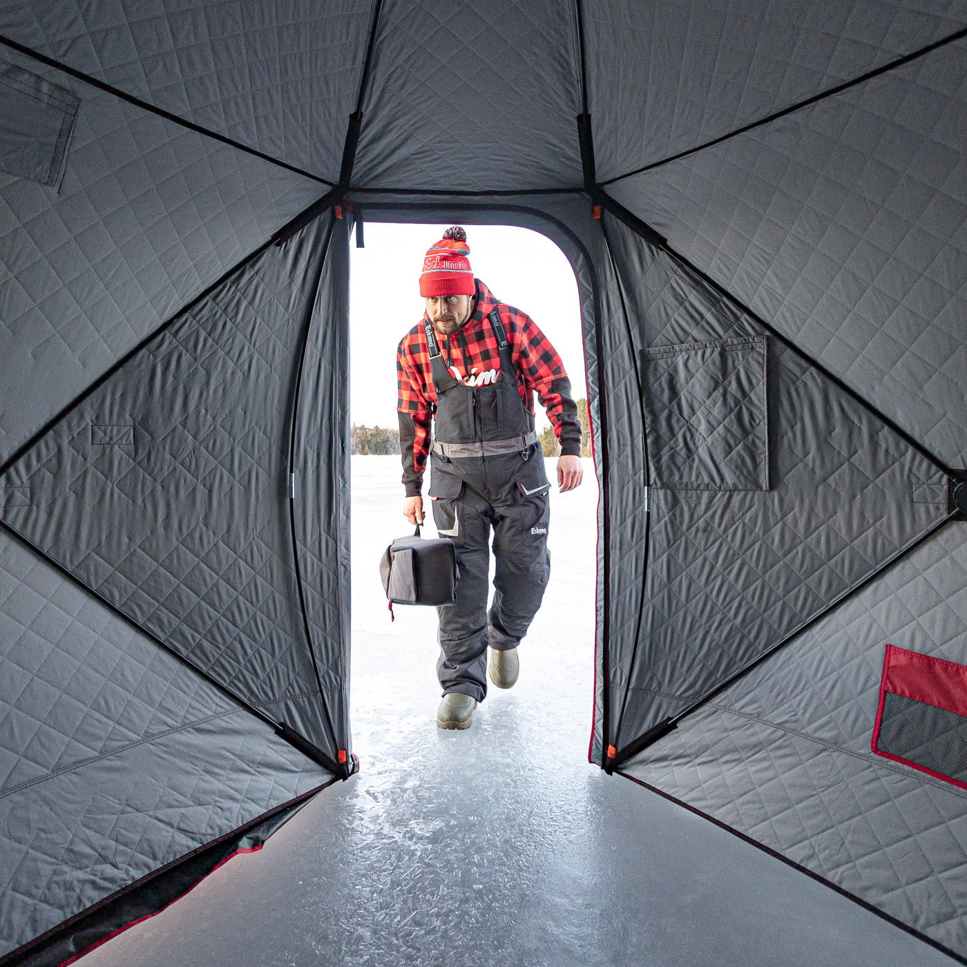 QuickFish HD ice shelter packed down for easy transport, showcasing its lightweight and portable design