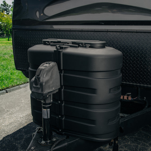 Close-up of the Camco RV propane tank cover's hinged access panel, allowing easy access to gas valves and changeover valves.