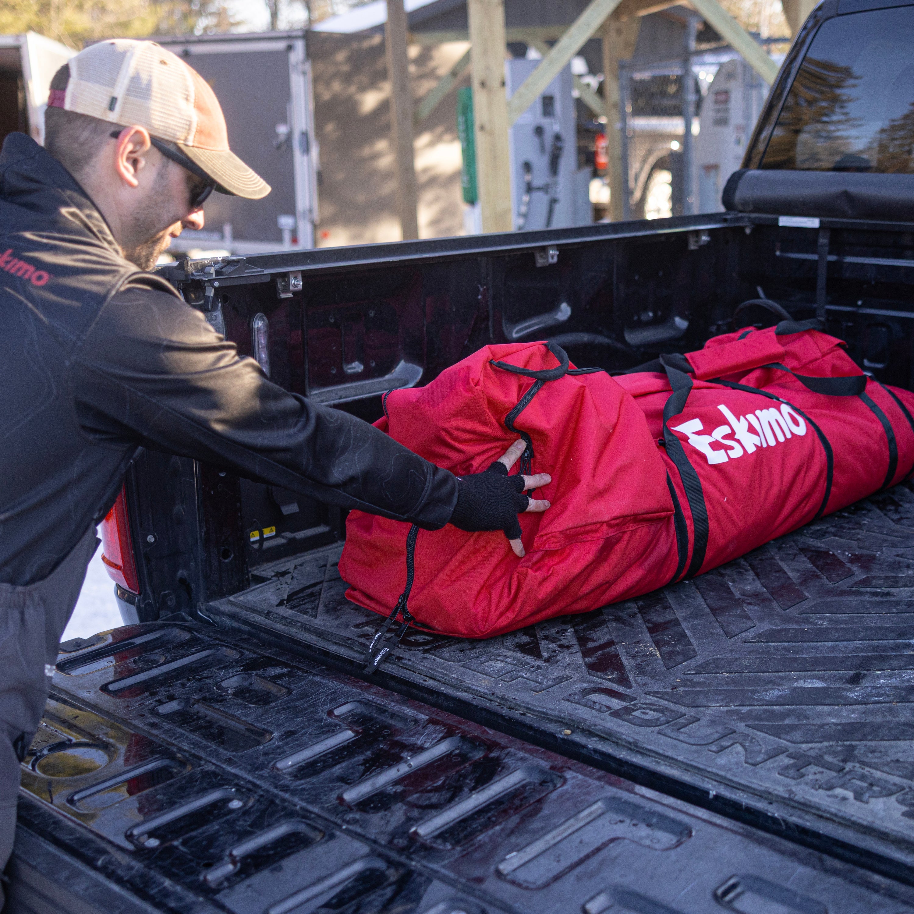 Eye-level removable windows on Eskimo Outbreak 850XDP ice fishing shelter with cover flaps for clear outdoor visibility