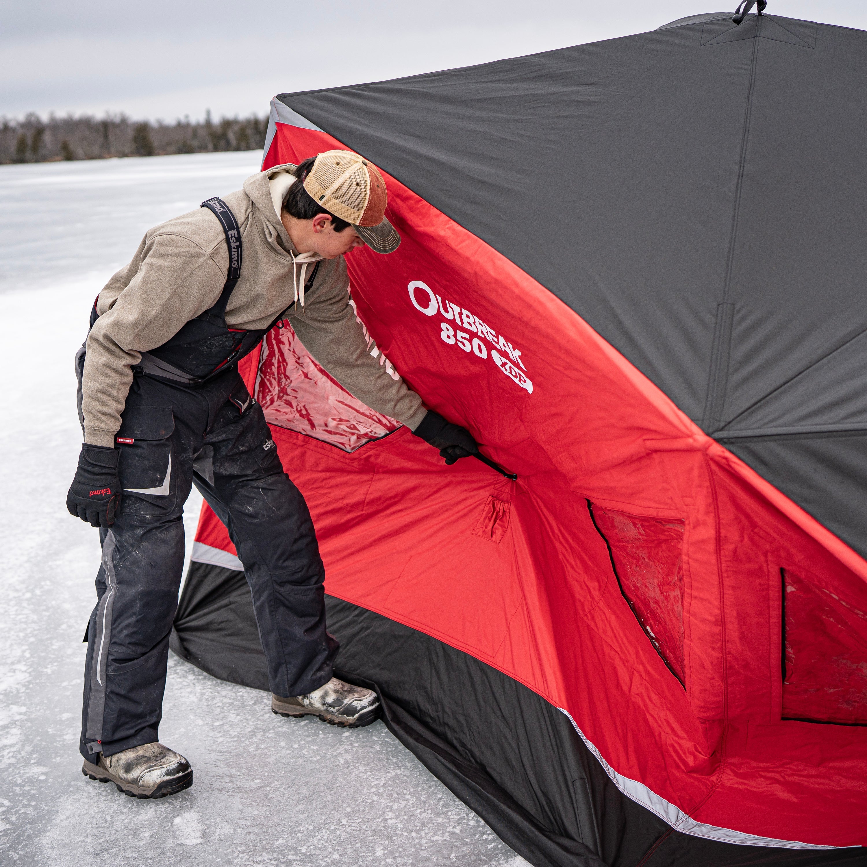 Outbreak 850XDP ice shelter with dual heat ventilation ports and propane line zipper for safe and efficient heating