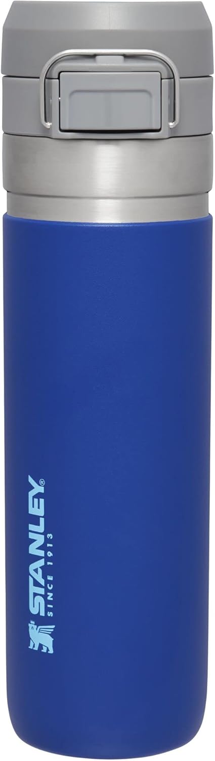 The Quick Flip GO Bottle, a sleek, durable travel thermos made of BPA-free 18/8 stainless steel. The bottle features double-wall vacuum insulation, keeping beverages hot for up to 8 hours or cold for up to 12 hours. Designed for on-the-go convenience with a spill-proof trigger-action, push-button lid
