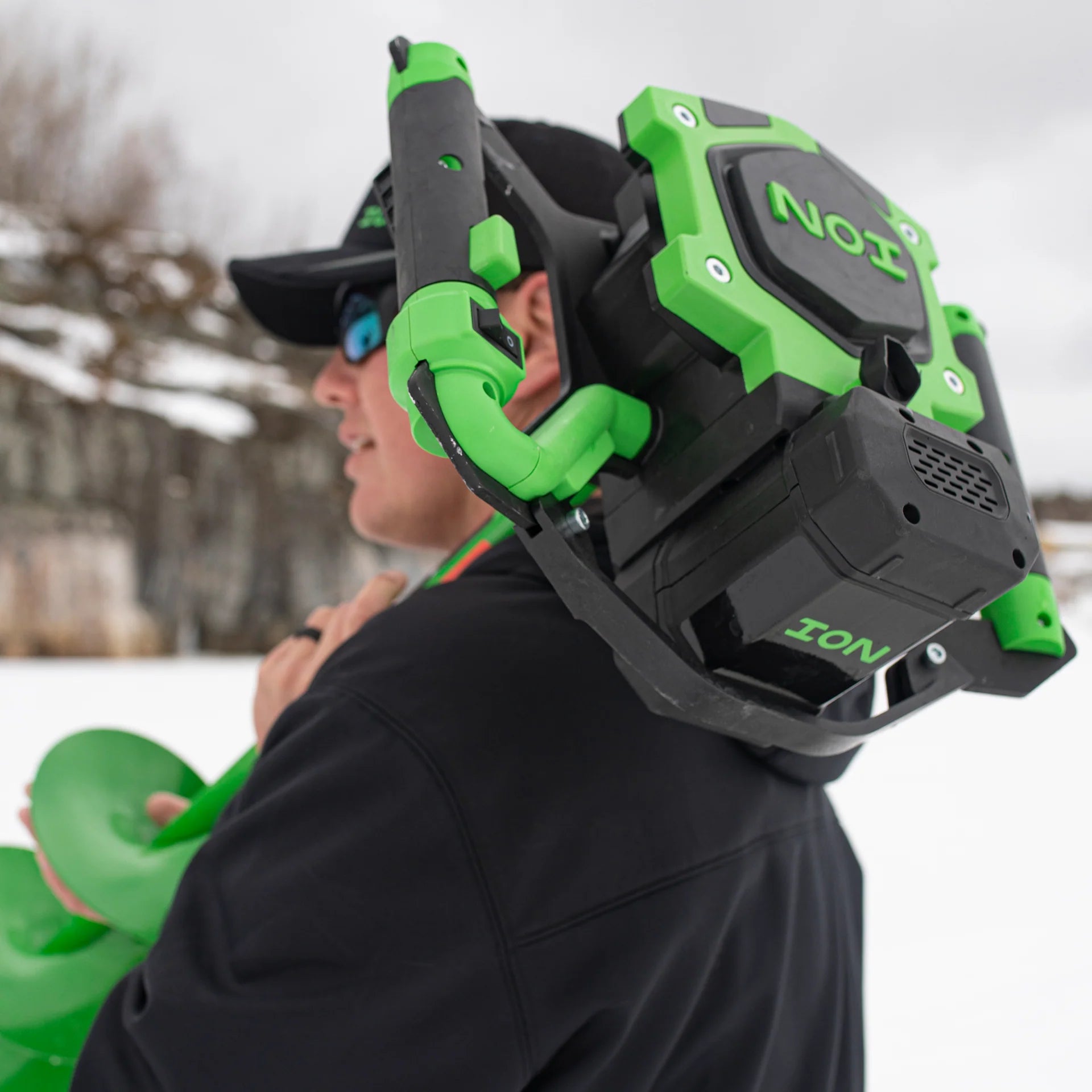 ION Alpha™ electric auger cutting through ice at 2.2 inches per second, faster than competitor 8-inch models