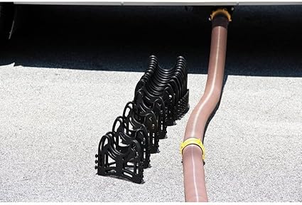 RV sewer hose support system with snap-fit hinges and sturdy plastic design