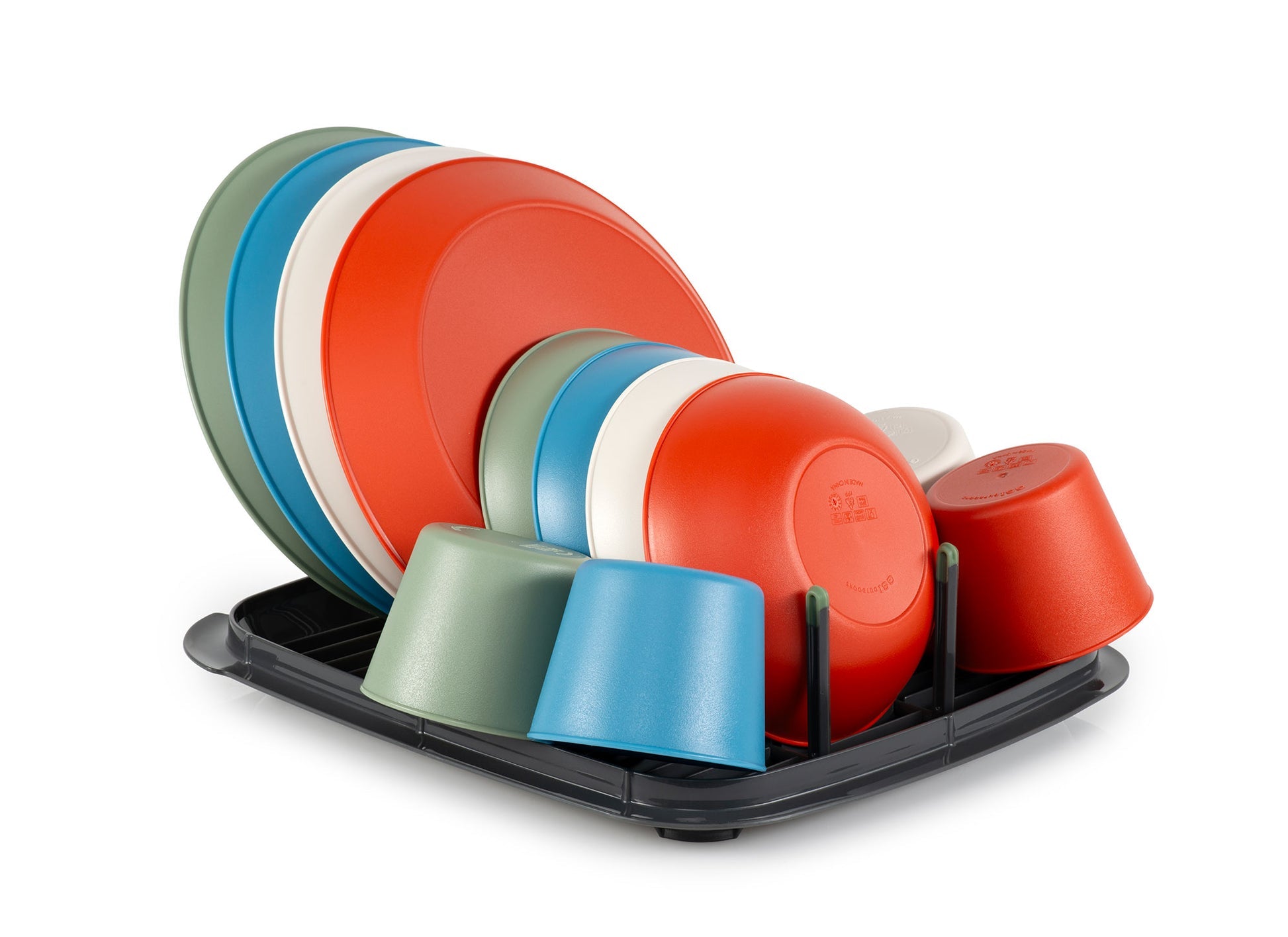 Colorful dishes including plates and cups on a black dish rack against a white background