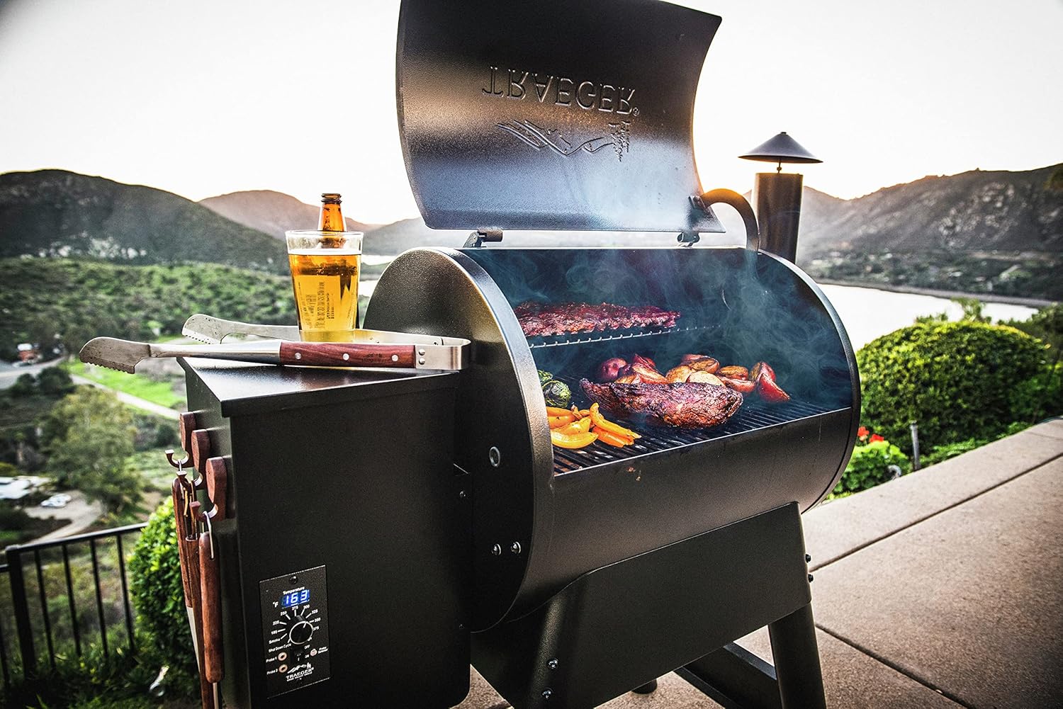 Wood fired pizza cooking on Traeger Pro 22 pellet grill backyard