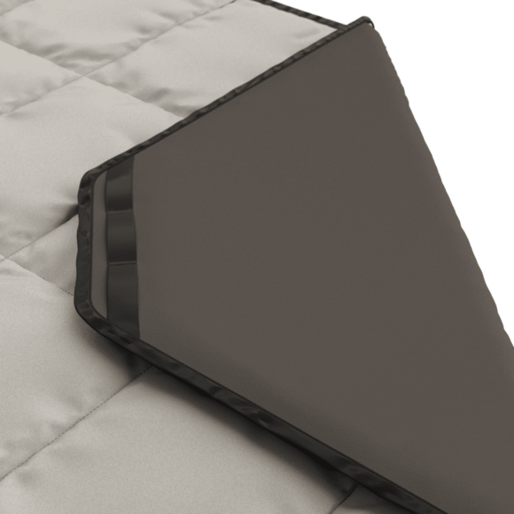 Dometic blanket packed into its included carry case for easy storage and travel.