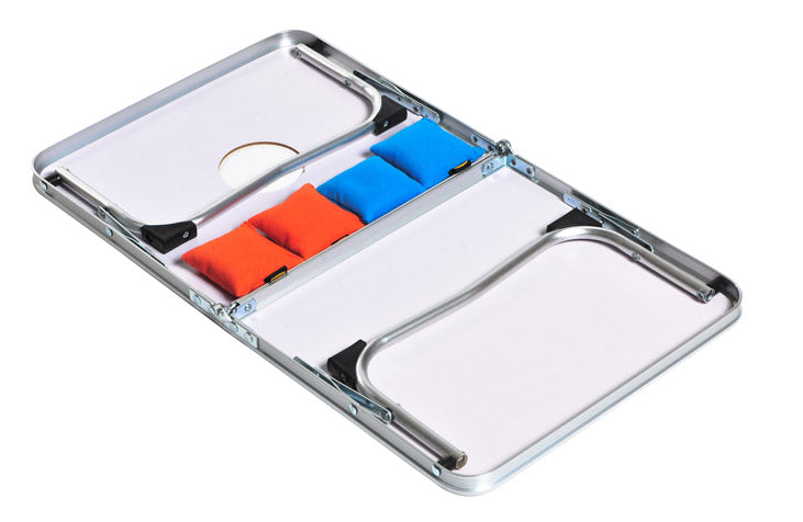 Low camp table that folds out for a fun cornhole game
