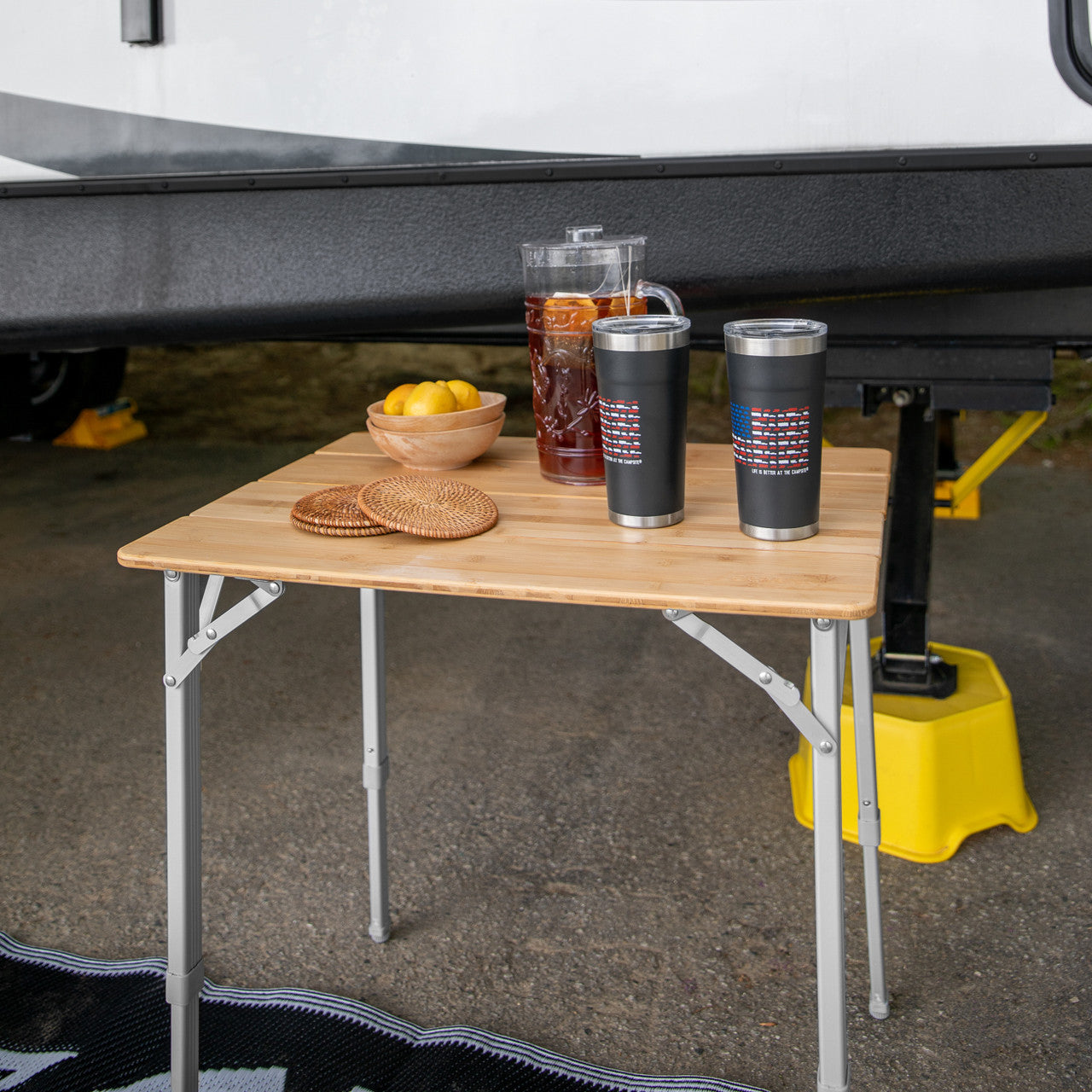 Portable bamboo table for RV camping, tailgating, picnics, and outdoor dining