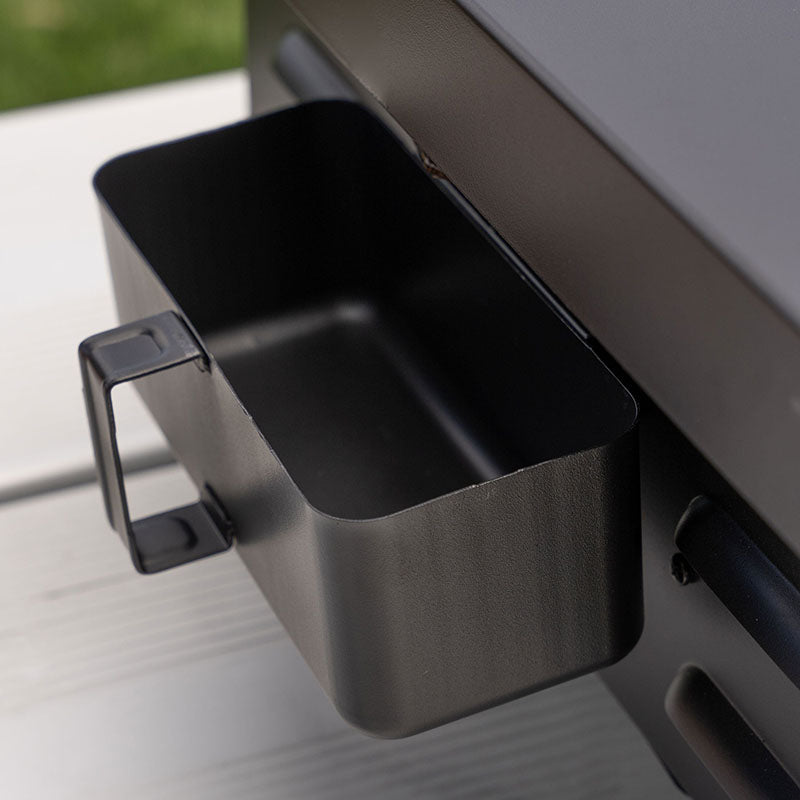 Rear grease management system on the 17-inch Adventure-Ready Griddle for easy cleanup