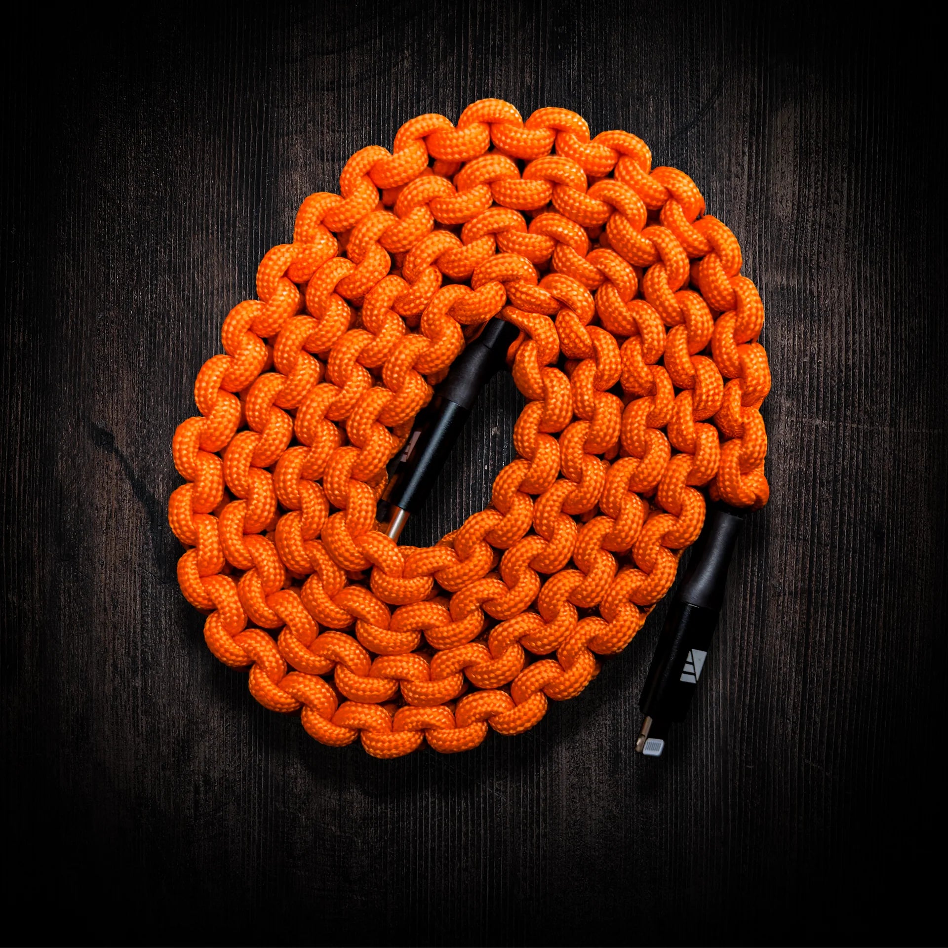 Image of a sleek Lightning to USB-C cable in action, charging an Apple device at 18W speed. Text overlay reads "Fast Charging - Charge Apple Devices at 18W Speed.