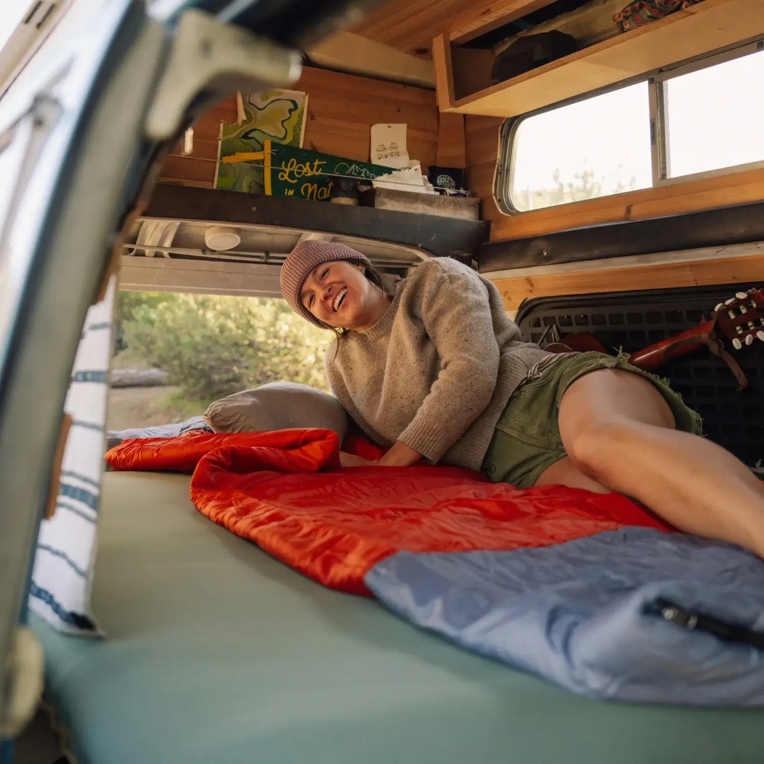 Camping sleeping bag with internal storage pocket