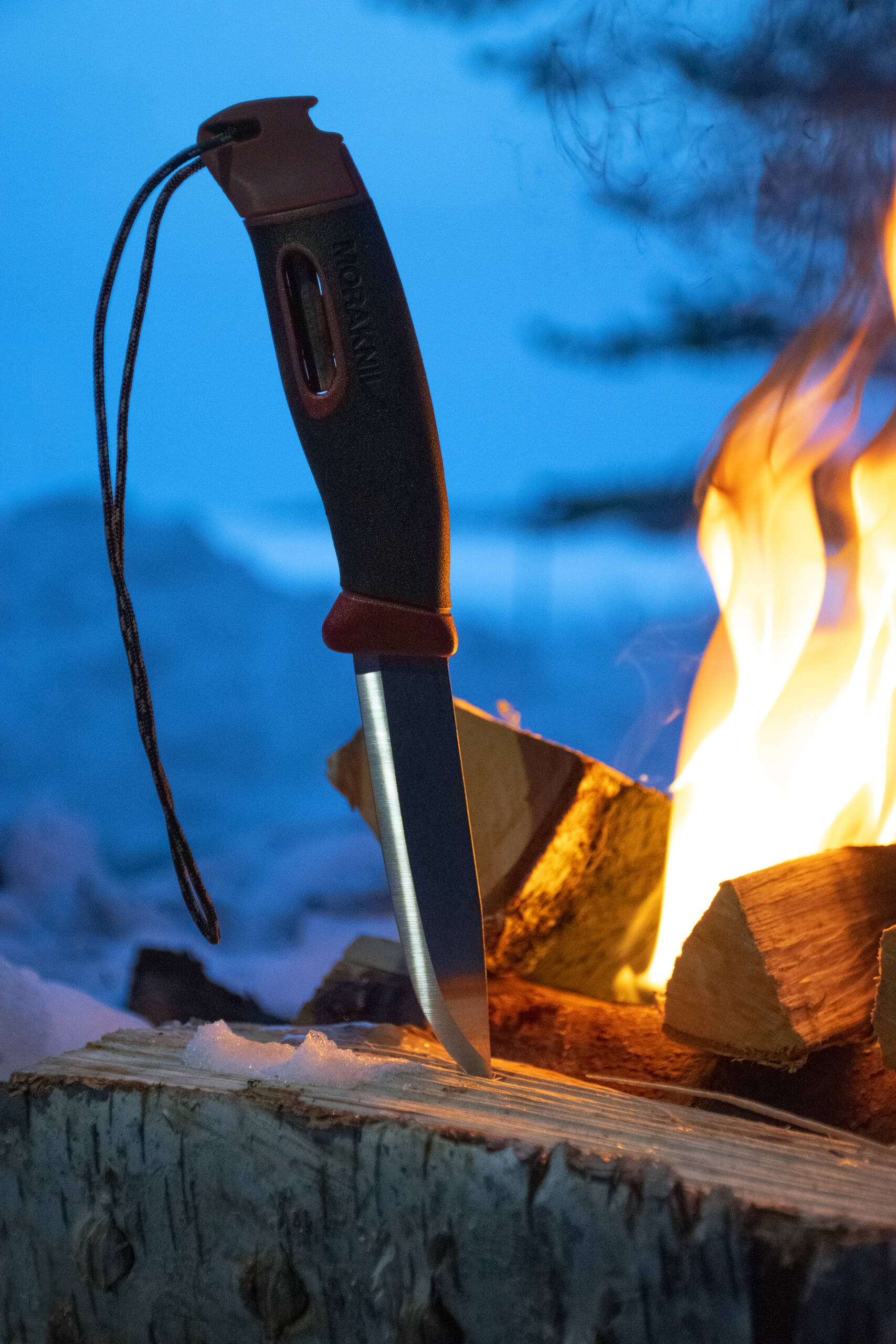 Morakniv Companion knife with built-in fire starter in ergonomic polymer handle, reflective paracord for easy visibility