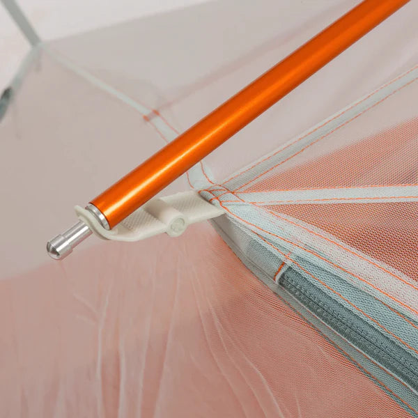 Compact backpacking tent packs down to 50 x 11 cm