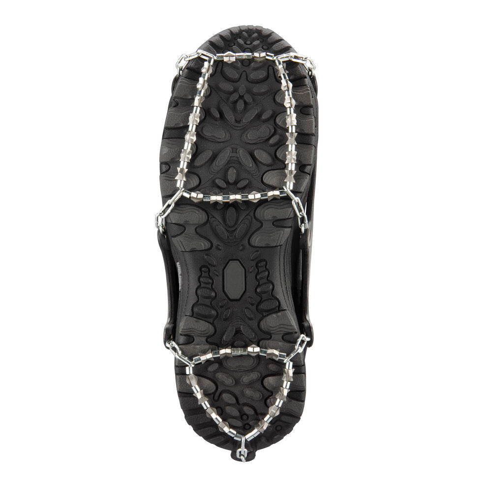 Black sandal with metal cleats on a white background