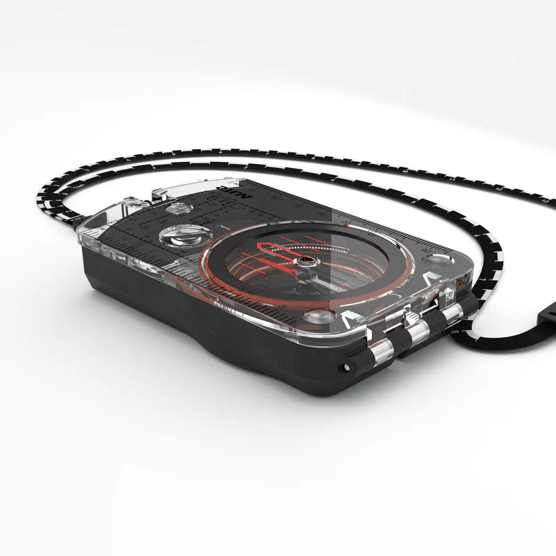 Close-up of the compass’s silicon rubber feet and tactile grip ring, providing enhanced stability and handling during precision map work.