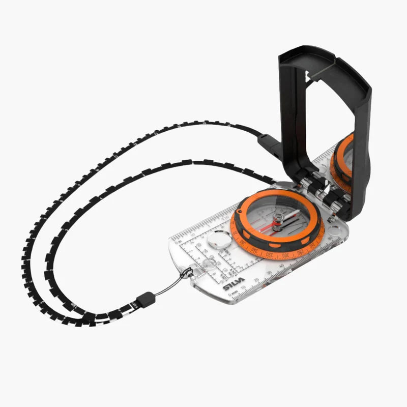 A Silva Expedition S compass displayed on its own, showcasing its transparent baseplate with black markings, a mirror sighting system, and a rotatable housing. The compass features luminous elements for night use and includes a detachable scale lanyard.