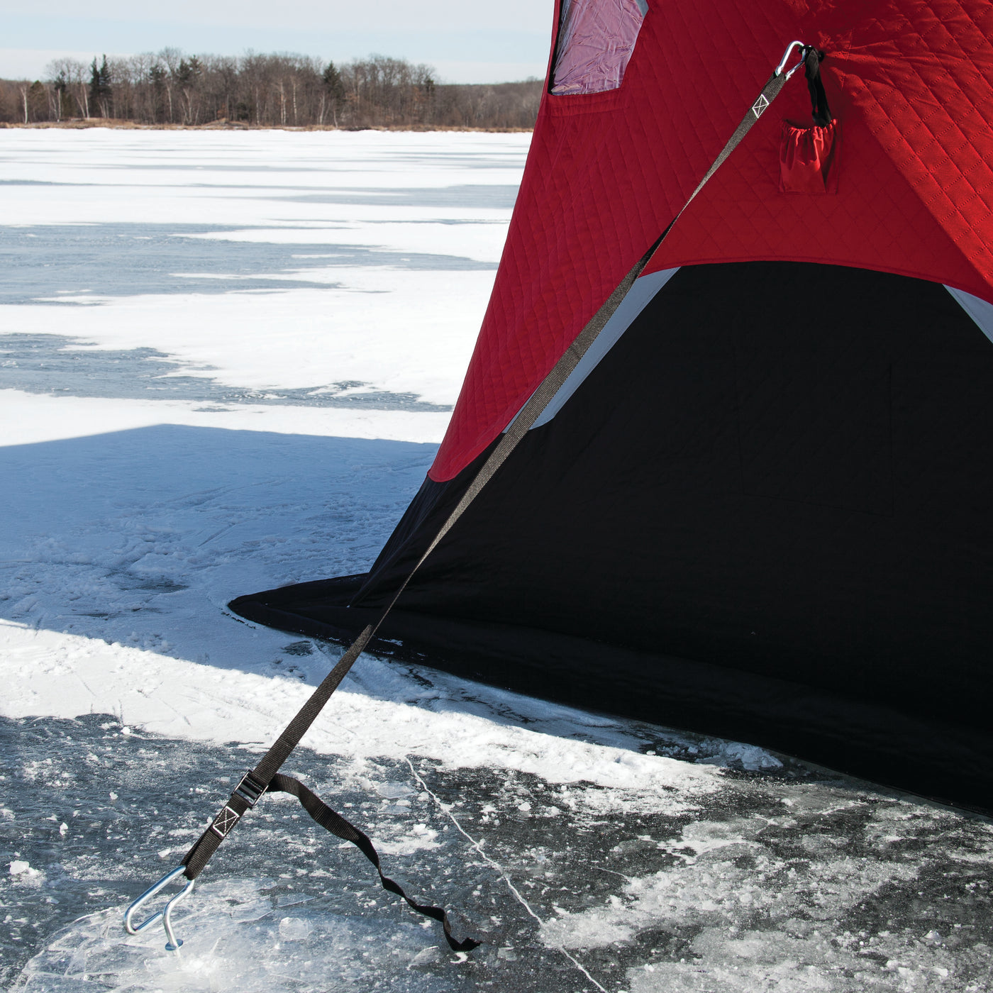 Detailed shot of the deluxe cam strap tie-downs on the FatFish 949i, designed for secure anchoring in windy conditions while ice fishing.