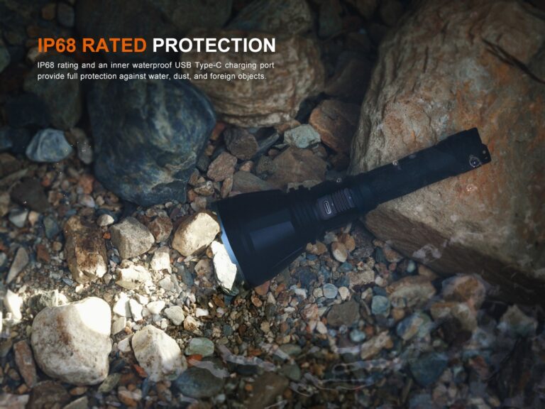 Fenix HT18R V2.0 long-range flashlight mounted on gear during nighttime outdoor activity