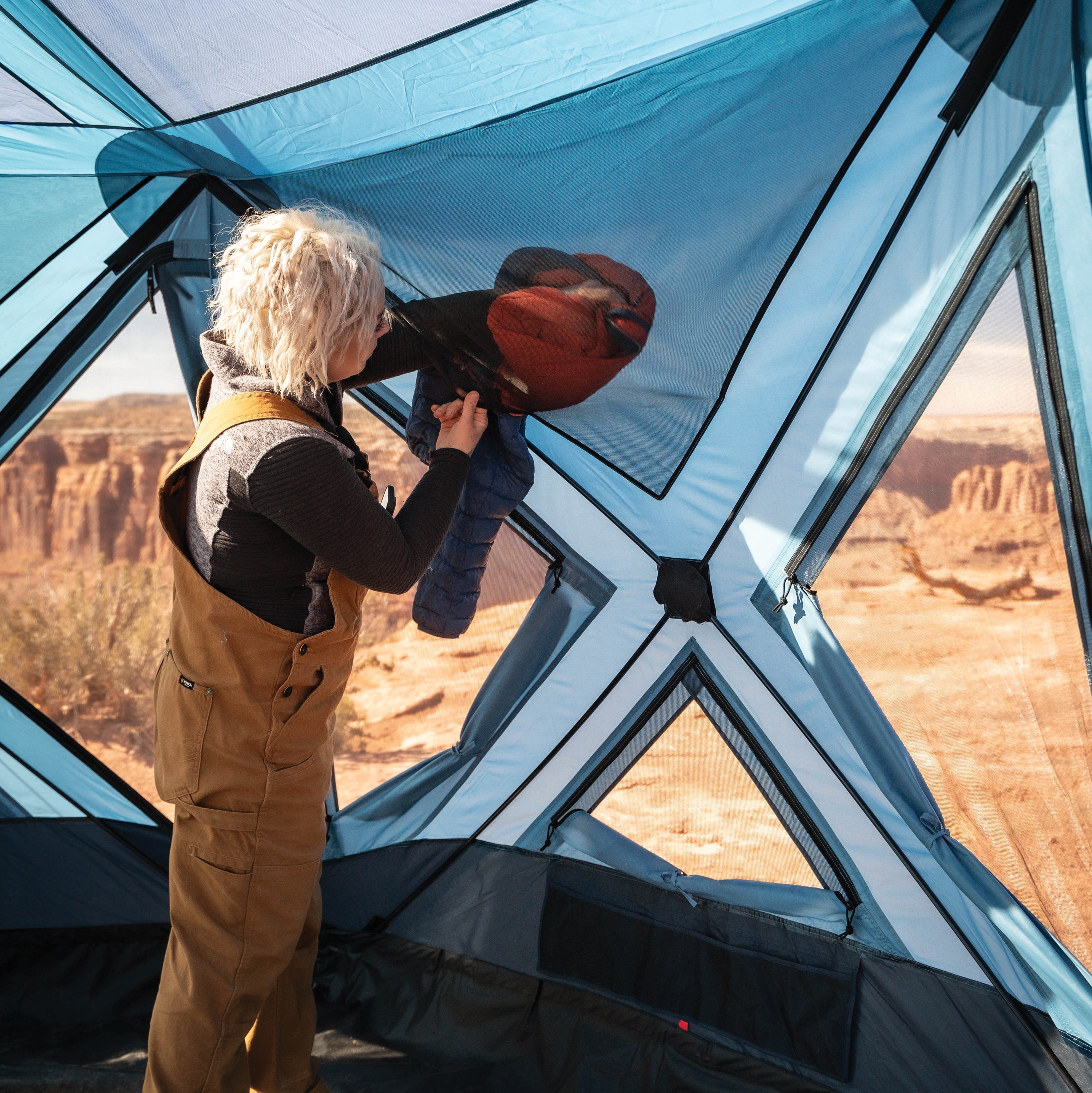 Instant setup overland base camp tent with hub technology