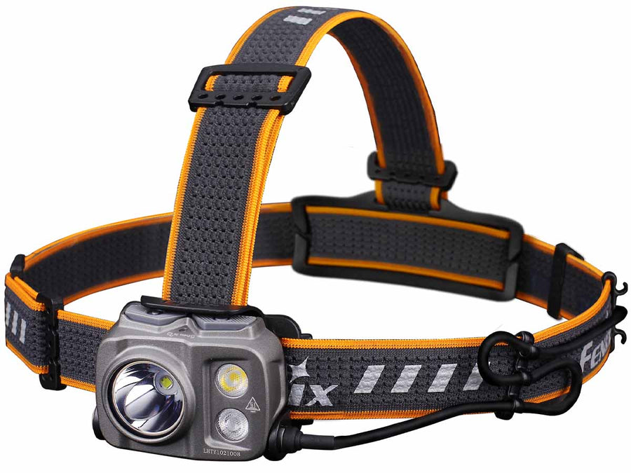 Front view of the Fenix HP25R V2.0 rechargeable headlamp, showing its dual spotlight and floodlight LEDs, compact design, and adjustable headband