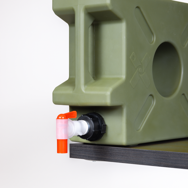 Green plastic container with a black valve and orange cap on a white background