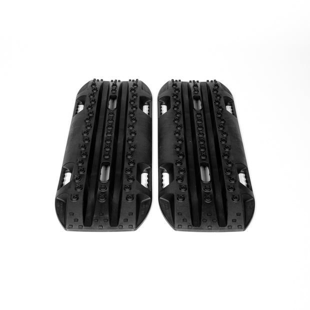 Fiberglass-reinforced RototraX recovery boards with X-shaped traction lugs for mud and sand recovery