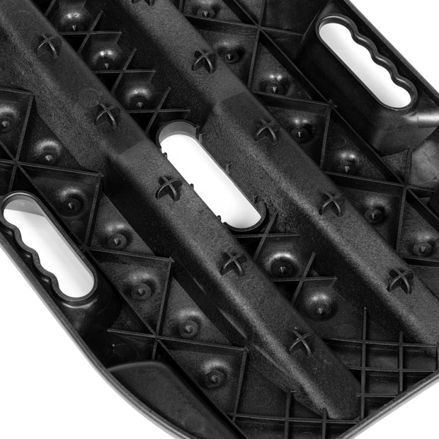 Pair of RototraX traction boards with lanyards for sand, snow, and mud recovery situations